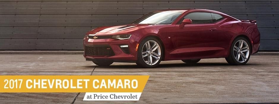 Image of Blue 2017 Chevrolet Camaro parked in the field